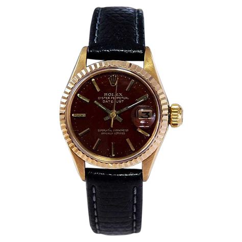 compro orologio rolex oro con quadrante in radica marrone|More.